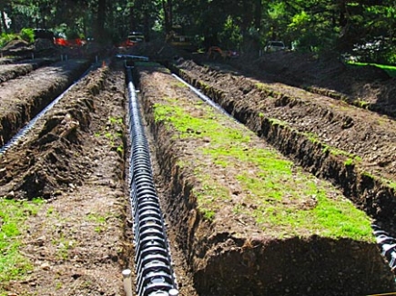 Pressurized drainfield for commercial system using infiltrator chambers